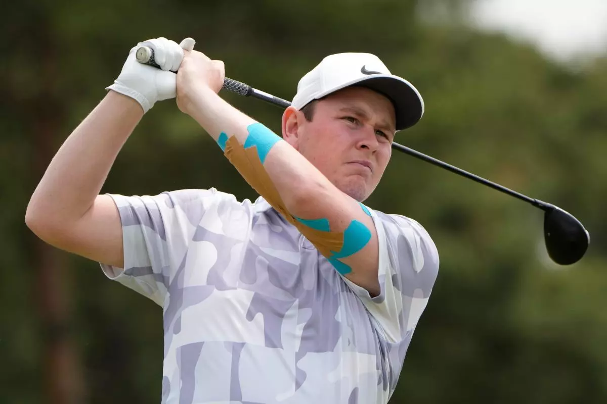 Robert MacIntyre of Scotland tees off