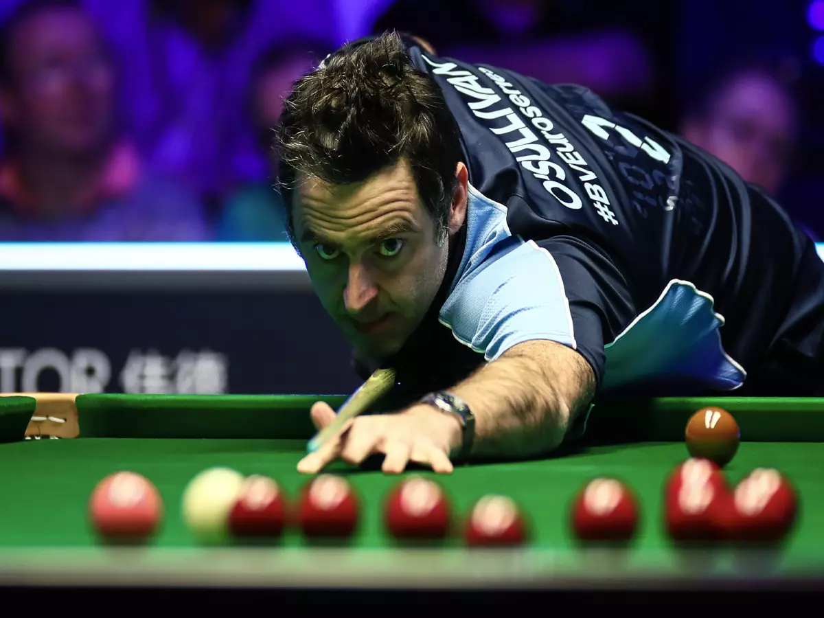 Ronnie O'Sullivan plays a shot to Alan McManus of Scotland at the second round of 2020 Snooker Shoot Out in Watford, the United Kingdom, 21 February 2020. Alan McManus of Scotland was defeate