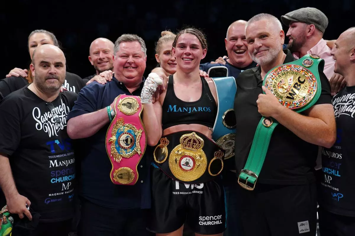 Savannah Marshall celebrates victory against Franchon Crews-Dezurn after their Undisputed World Super-middlewight title bout - June 2023