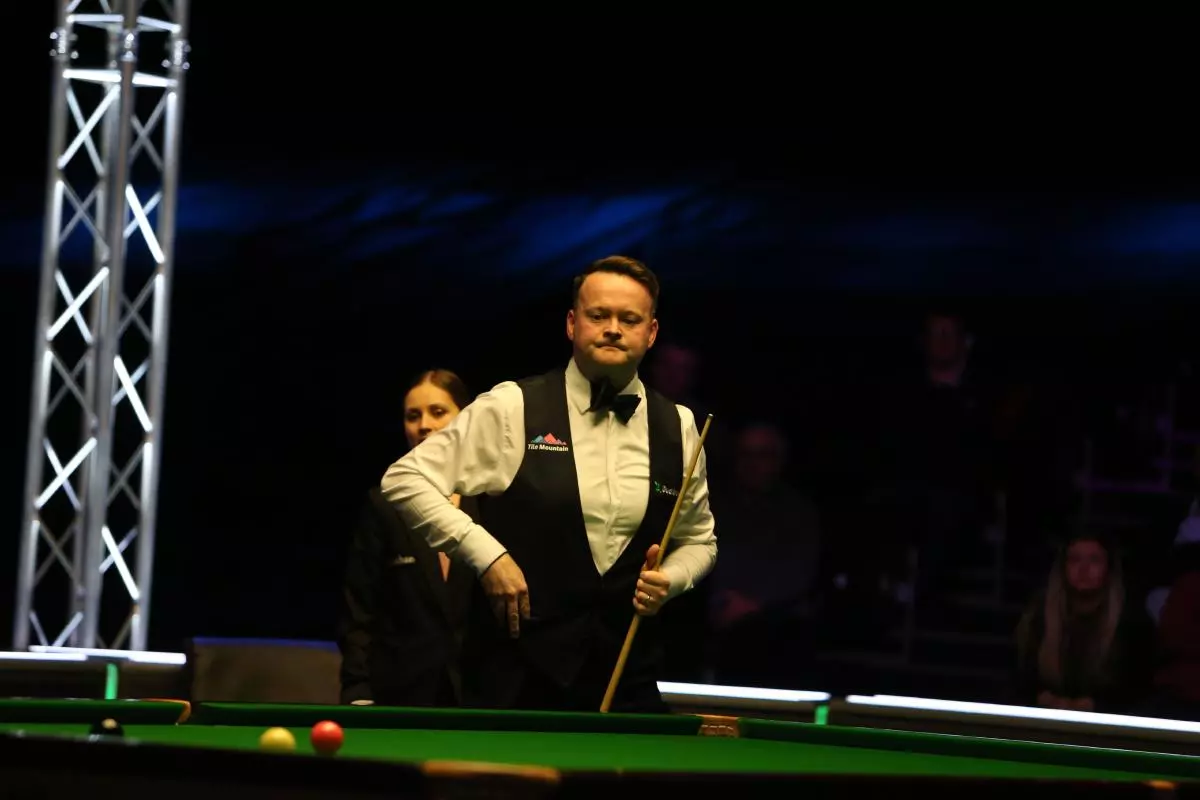 Shaun Murphy plays against Ryan Day