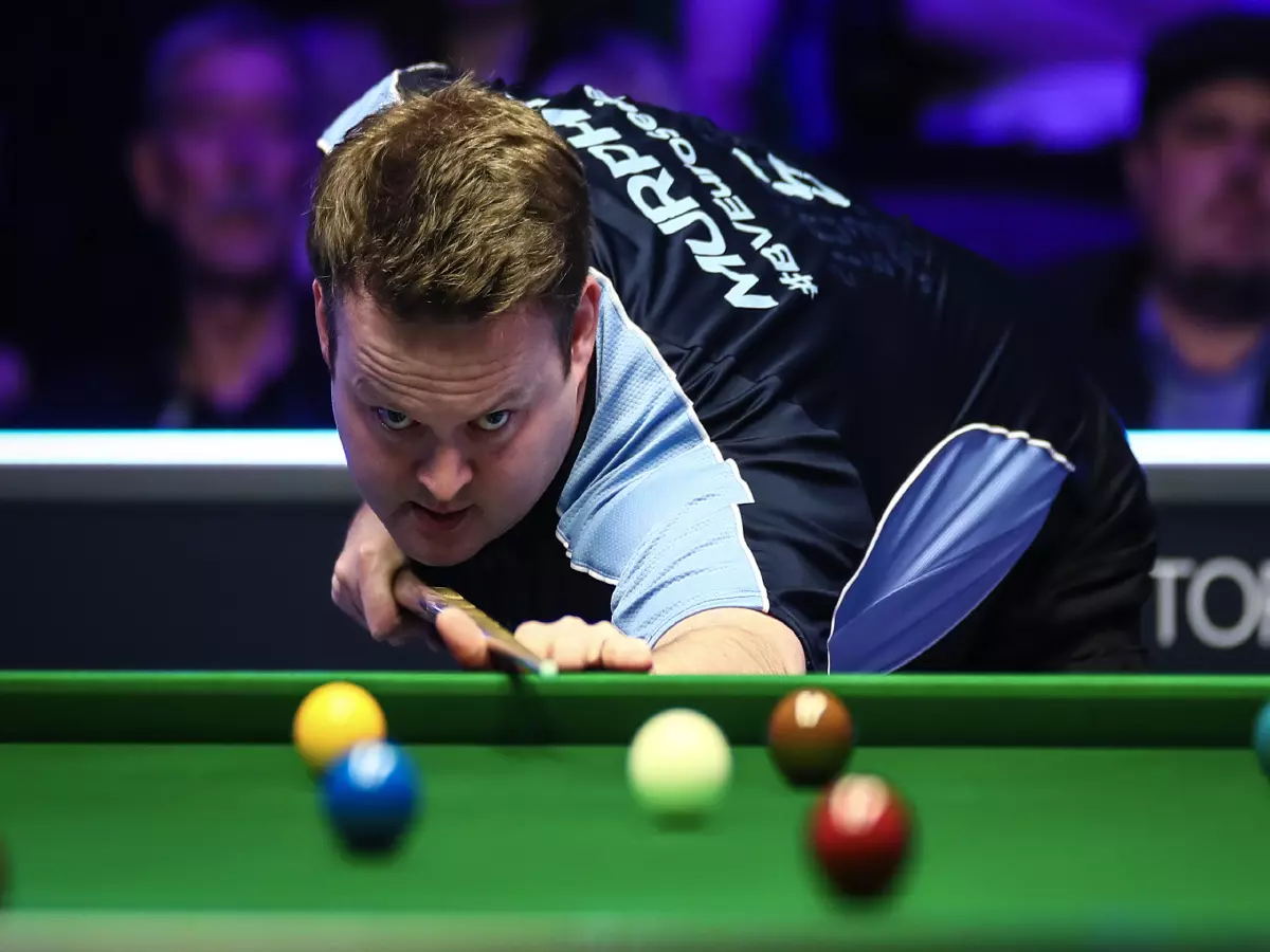 Shaun Murphy of England plays a shot to Anthony McGill of Scotland at the fourth round of 2020 Snooker Shoot Out in Watford, the United Kingdom, 23 February 2020. Shaun Murphy of England was