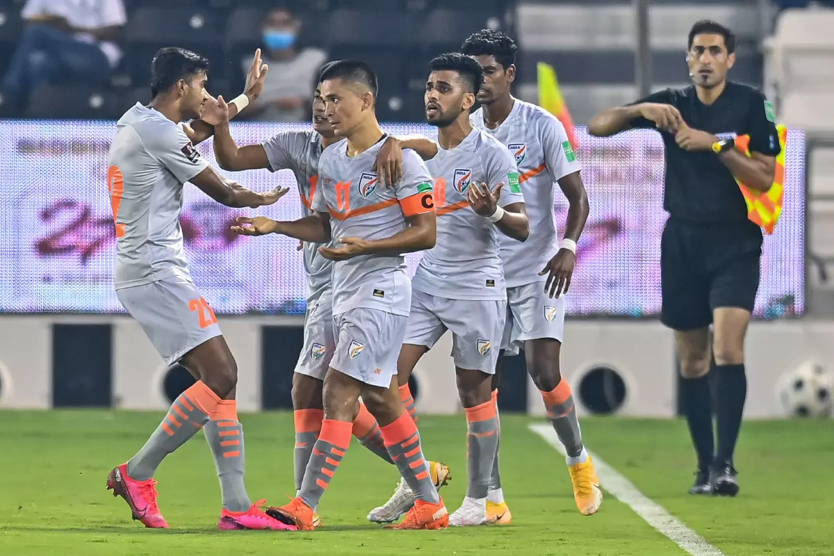Sunil Chhetri (3rd L) of India celebrates after scoring the opening goal during the second round Group E match