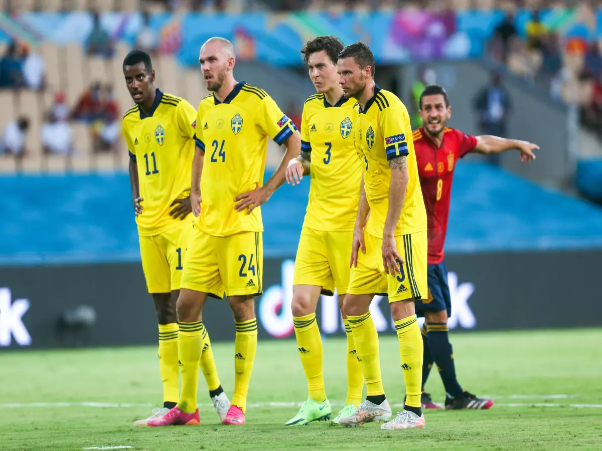 Sweden's Alexander Isak stands next to Marcus Danielson, Victor Lindelof and Sweden's Marcus Berg