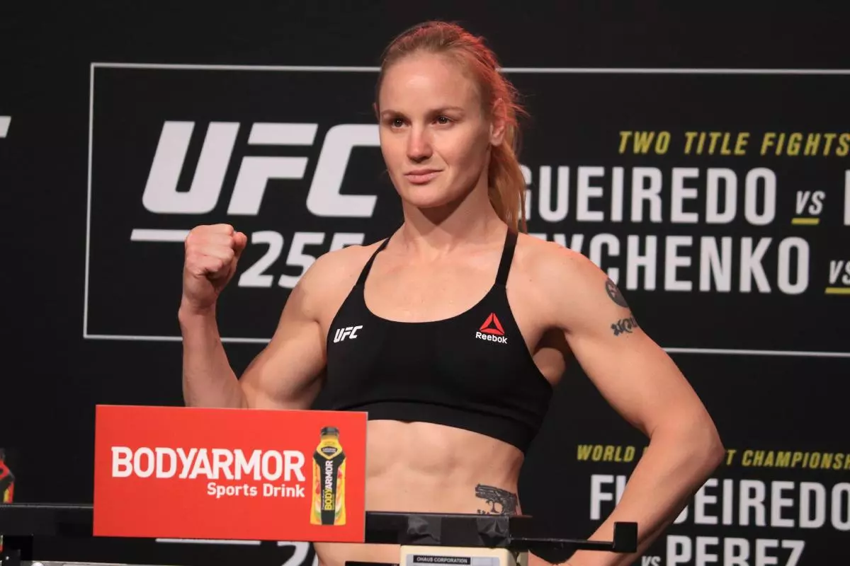 Valentina Shevchenko poses on the scale