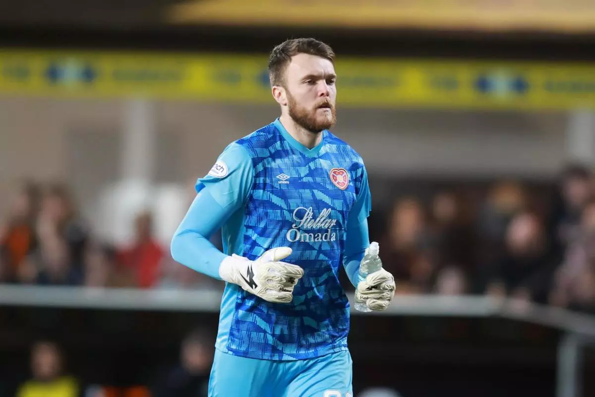 Zander Clark of Heart of Midlothian comes on to replace the injured Craig Gordon