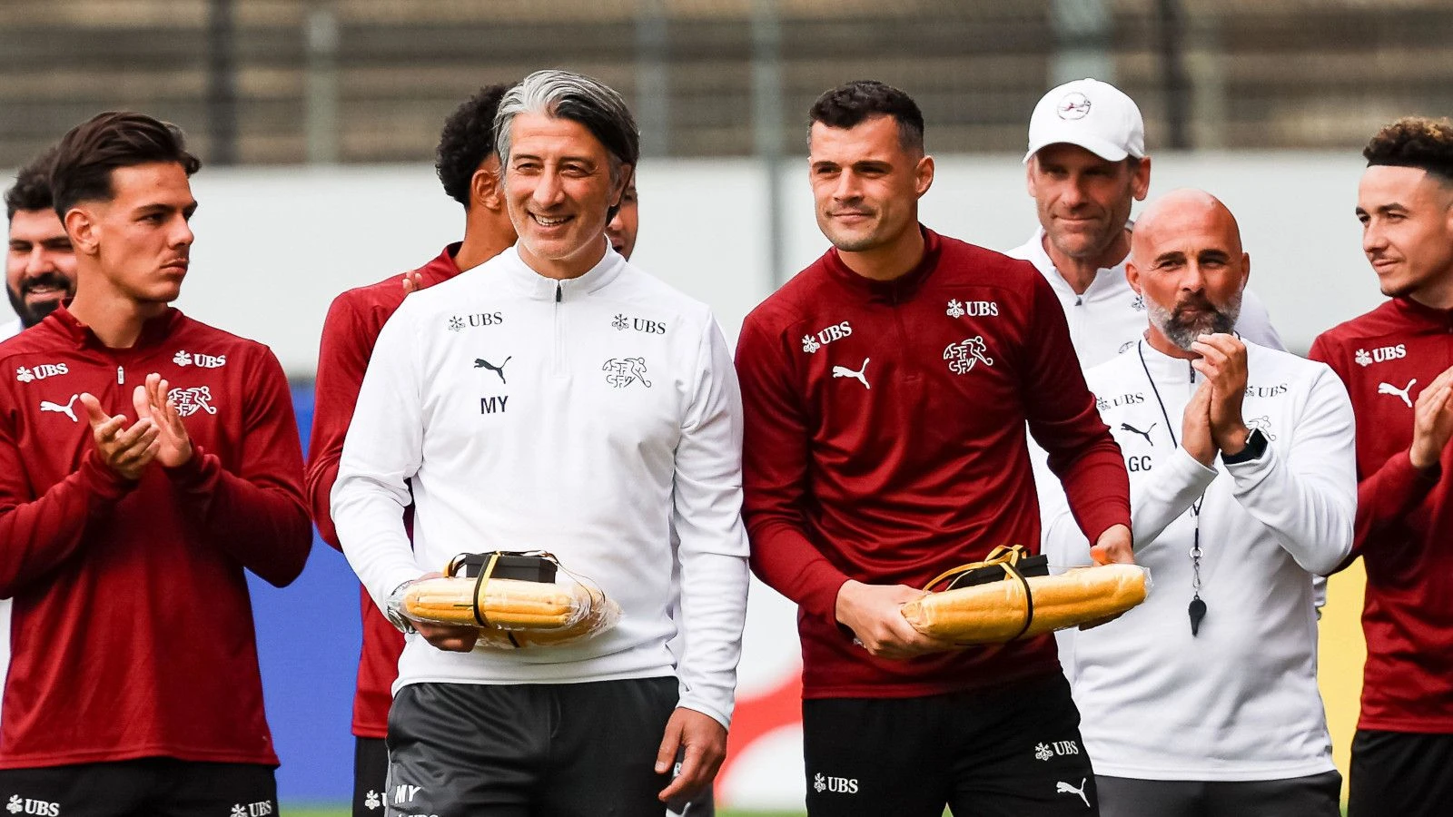 Switzerland coach Murat Yakin and Granit Xhaka