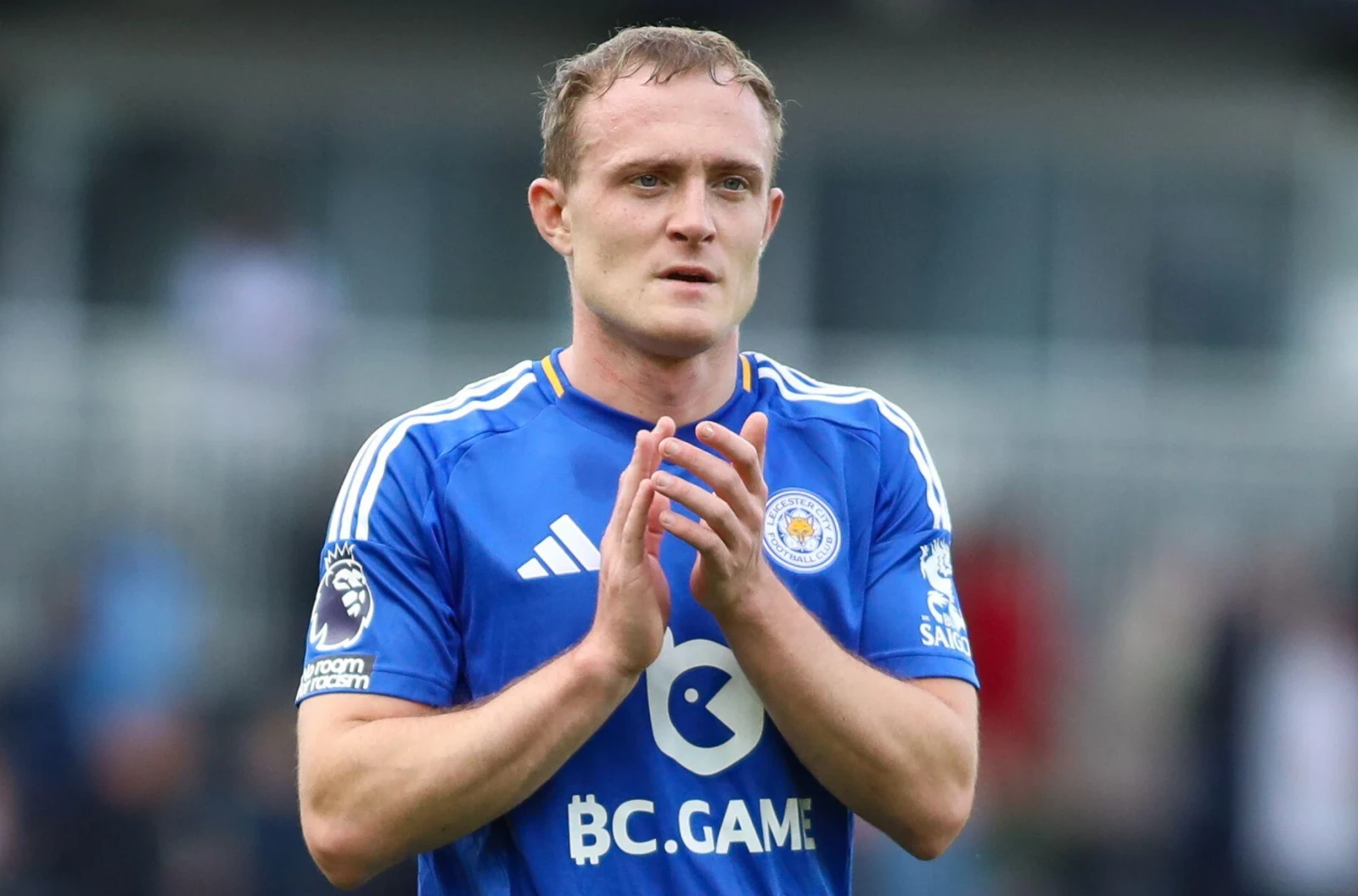 Oliver Skipp of Leicester City applauds the fans