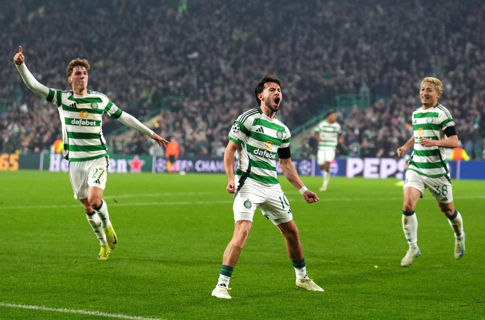 Nicolas Kuhn celebrates scoring for Celtic in the Champions League