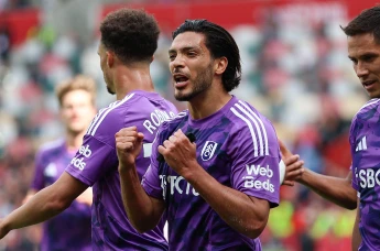 Raul Jimenez of Fulham celebrates with his team mates after scoring