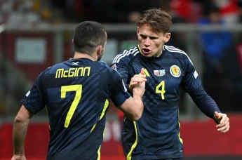Scotland's John McGinn celebrates scoring their side's first goal of the game with Scott McTominay during the UEFA Nations League