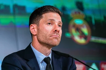 Xabi Alonso speaks to reporters during his presentation as Real Madrid's new coach