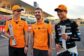 Oscar Piastri, Andrea Stella and Lando Norris of McLaren