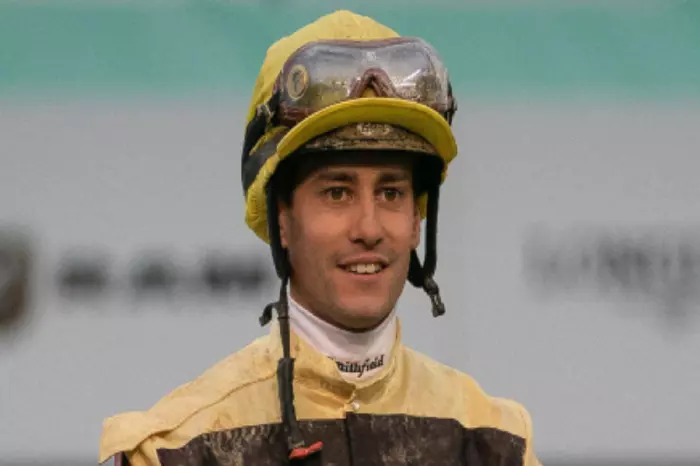 Jockey Flavien Prat after being named the winner of the 145th Kentucky Derby at Churchill Downs in Louisville, Kentucky on 4th May 2019. Credit Bryan Woolston/ZUMA Wire