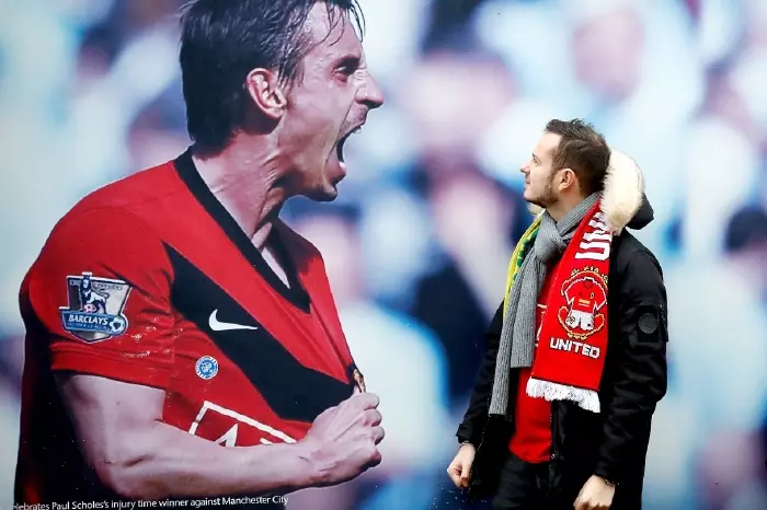 Fans looks at Gary Neville pic