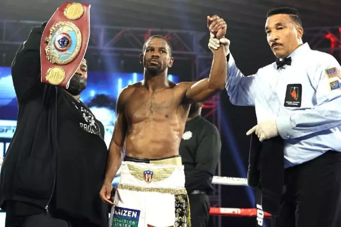 Herring celebrates DQ victory over Oquendo