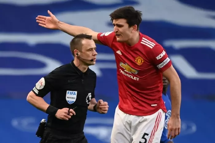 Harry Maguire remonstrates with Stuart Attwell Manchester United Chelsea Feb21