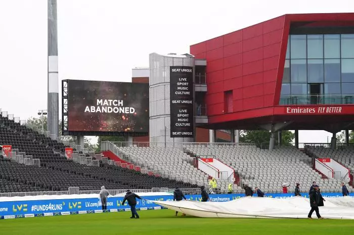 The big screen displays the abandonment of day five of the fourth LV= Insurance Ashes Series test match at Emirates Old Trafford - July 2023