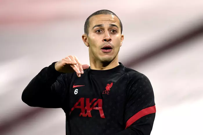 Thiago Alcantara warms up before a Liverpool match