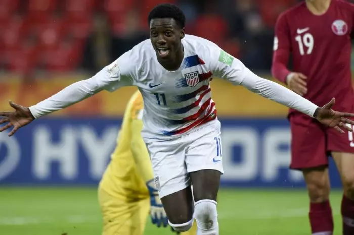 Tim Weah of USA celebrates scoring