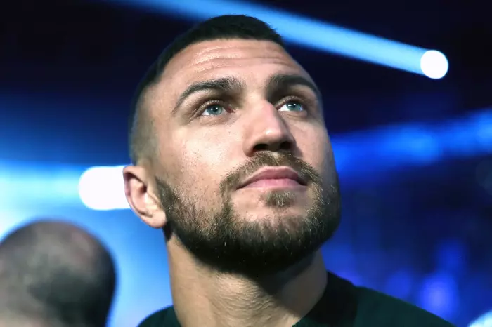 Vasyl Lomachenko watches a fight from ring side in Philadelphia, Pennsylvania, United States
