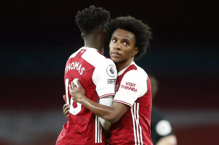 Willian celebrates an Arsenal goal with Thomas Partey