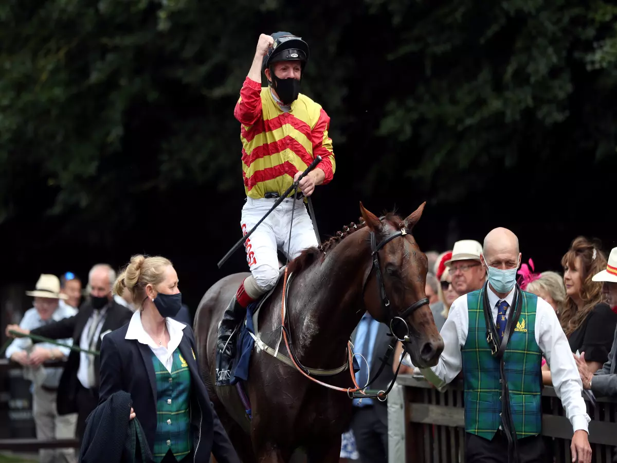 Franny Norton celebrates after winning the Princess Of Wales's Stakes on Sir Ron Priestley