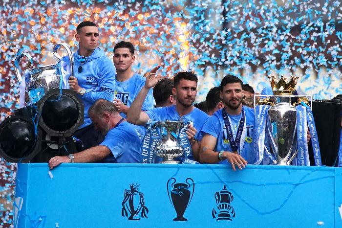 Manchester City Players And Fans Shrug Off Bad Weather To Celebrate At