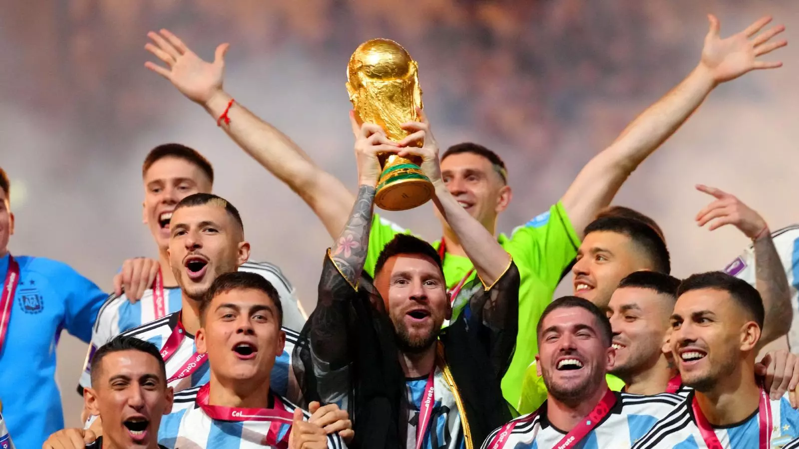 What was Lionel Messi wearing when he held aloft World Cup trophy